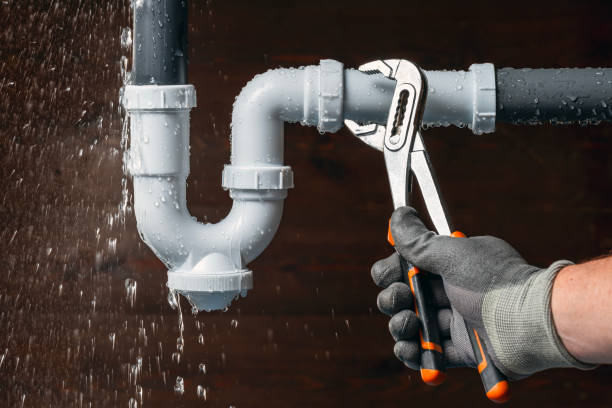 Professional Drain Cleaning technician working in Earlham, IA